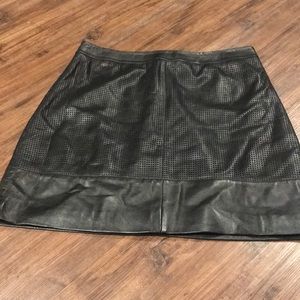 Black leather mini skirt